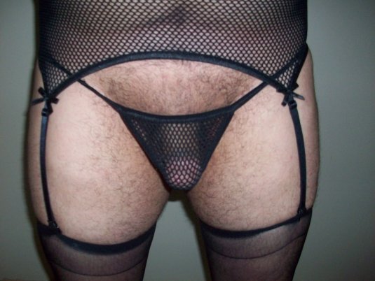Мужик в чулках и женских трусиках