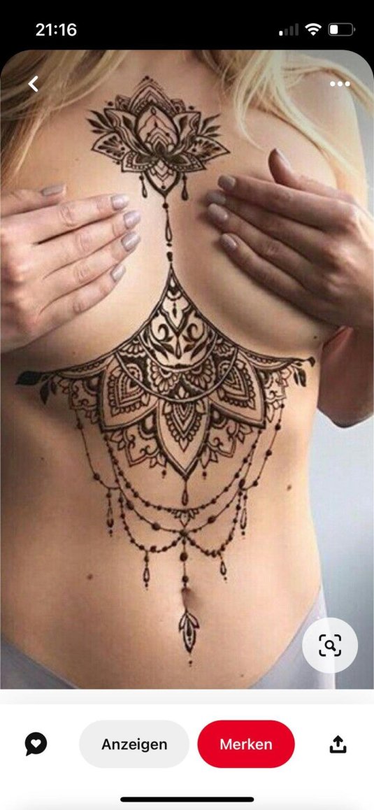 Тату под грудью женские