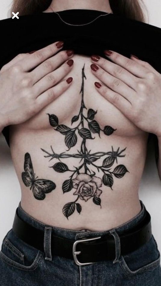 Тату на грудине женские