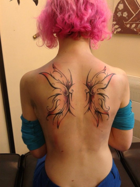 Крылья на спине тату