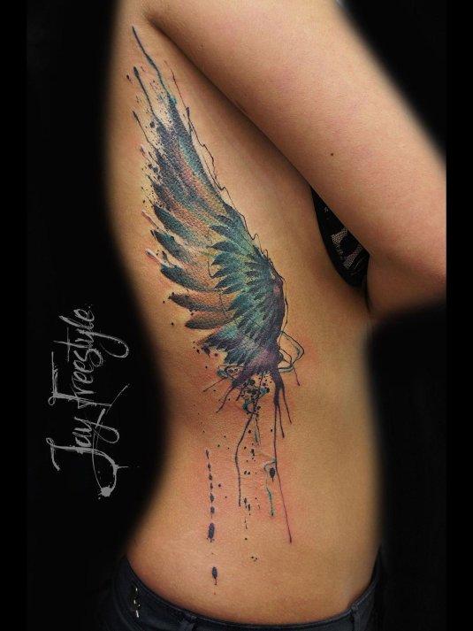 Акварельные крылья тату