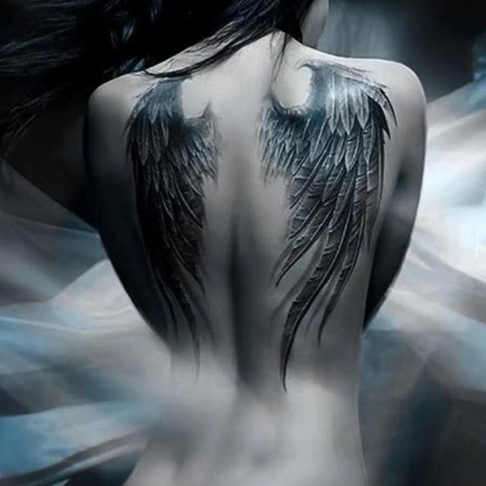 Крылья на спине тату