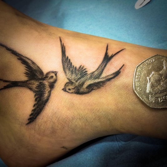 Ласточка татуировка